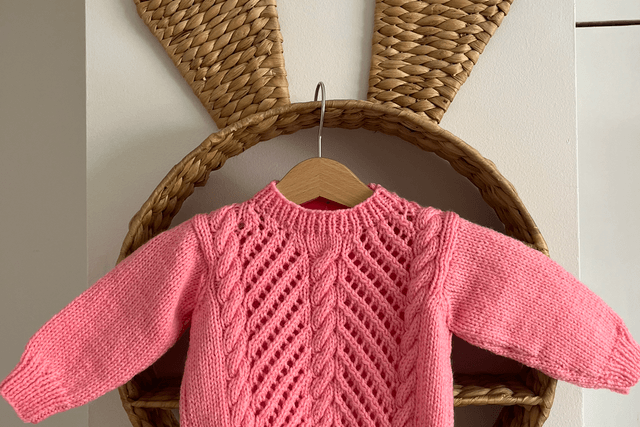 Pink hand knitted jumper